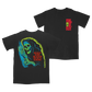Black short-sleeved holy ghost t-shirt with glowing skeleton and red fall out boy uk merchandise text on front and back